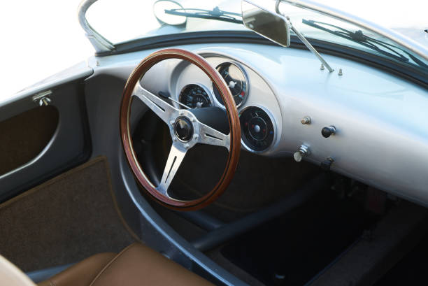 istock Vintage retro car interior, close-up. Old automobile steering wheel 1177068498
