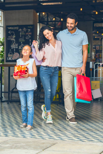 istock Family shopping in mall 1177072576