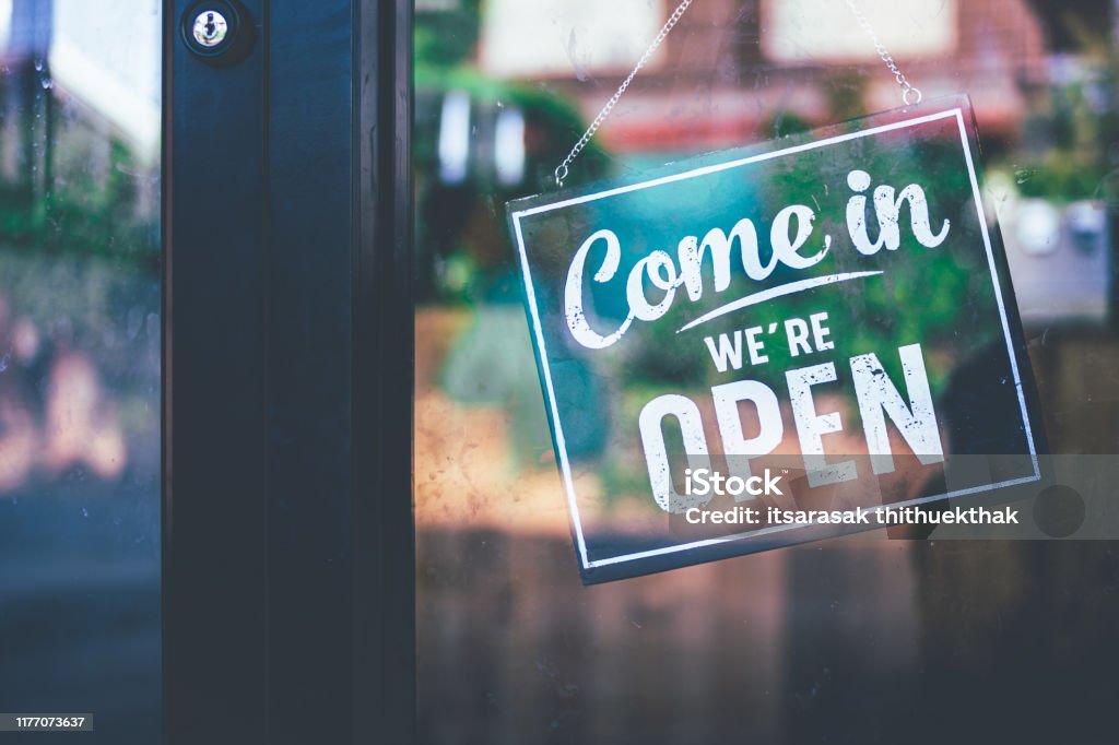 Come in we're open, vintage black retro sign Open Stock Photo