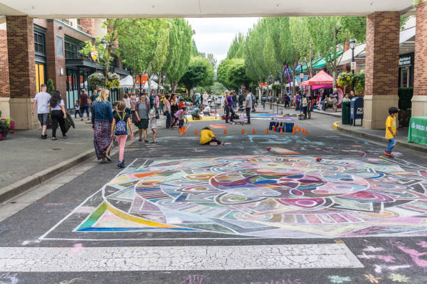 Child playing outdoors - drawing on the ground