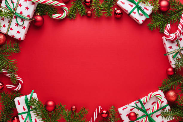 istock Christmas red background with oval decorative frame 1177078750