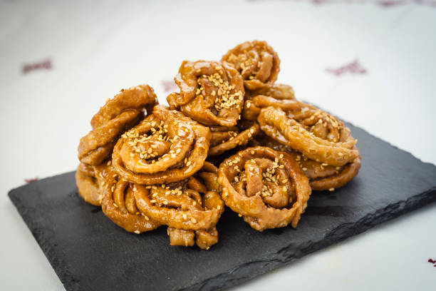 istock Chebakia moroccan pastries on a slate plate on a handmade tablecloth. 1177081063