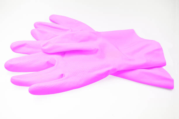 istock Pink household rubber gloves insulated on white background 1177083852