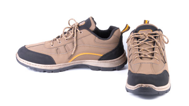istock pair brown sneakers isolated on white background 1177085291