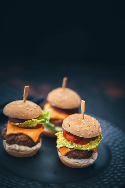 istock Mini Burgers with Tomato, Onion and Lettuce 1177090422