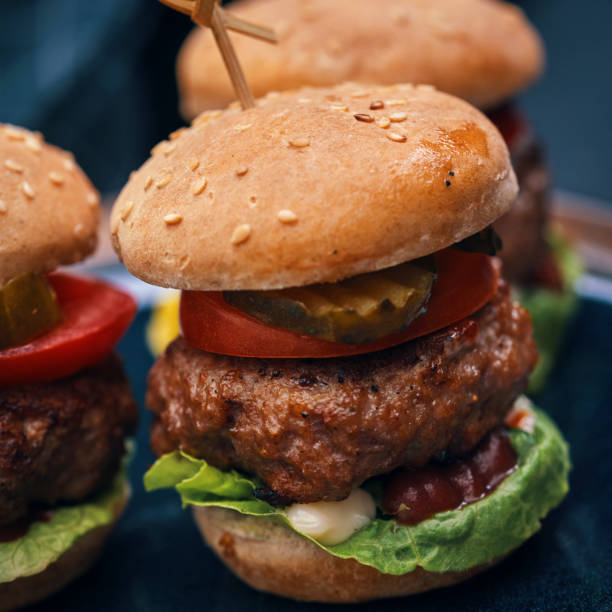 istock Mini Burgers with Tomato, Onion and Lettuce 1177090444