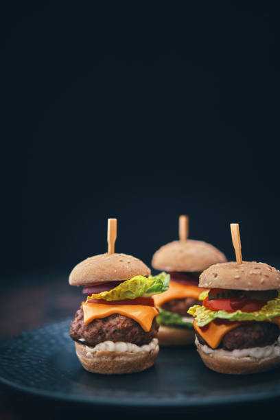 istock Mini Burgers with Tomato, Onion and Lettuce 1177090461