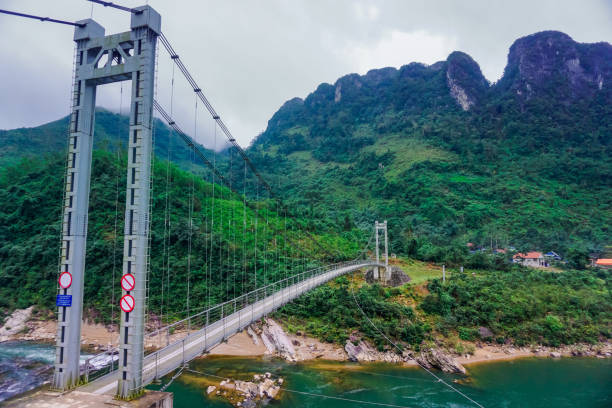 istock Bridge over a mountain river in Quang Binh province in Vietnam 1177105423