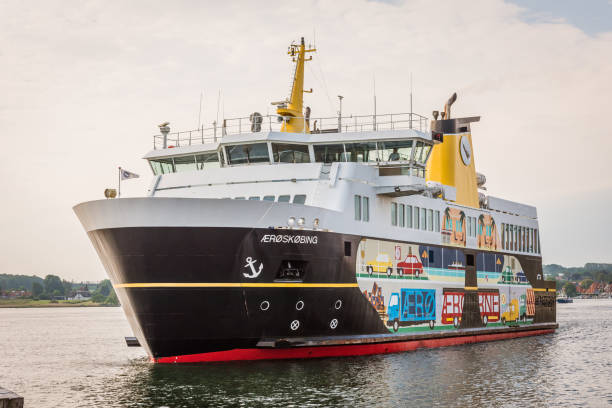 the colourful ferry from aero arriving at the port of svendborg - aero imagens e fotografias de stock