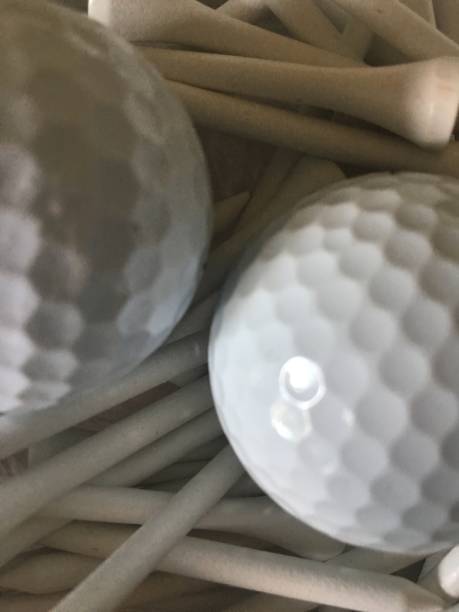 istock Bucket of golf balls and golf tees white 1177112730