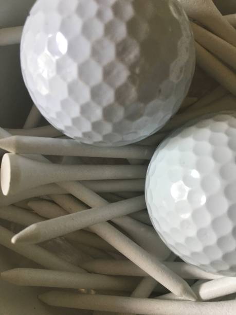 istock Bucket of golf balls and golf tees white 1177112760