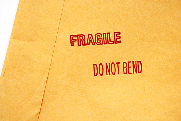 istock Shipping envelope with fragile stamp 117711683