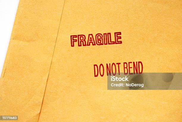 Foto de Envio Envelope Com Selo Frágil e mais fotos de stock de Aviso de frágil - Aviso de frágil, Carimbo, Conselho