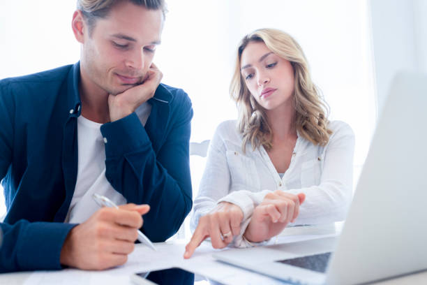 istock Young Couple working on their home finances. 1177117718