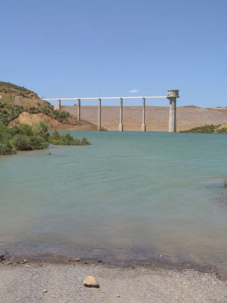istock Futuristic structure of a water intake tower above the lake 1177124554