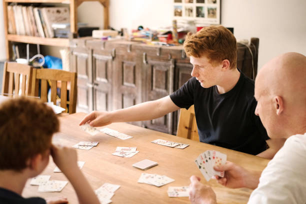 istock A playing cards game at home 1177127069