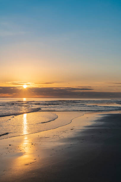 istock Ocean beach as sun is on horizon 1177129896