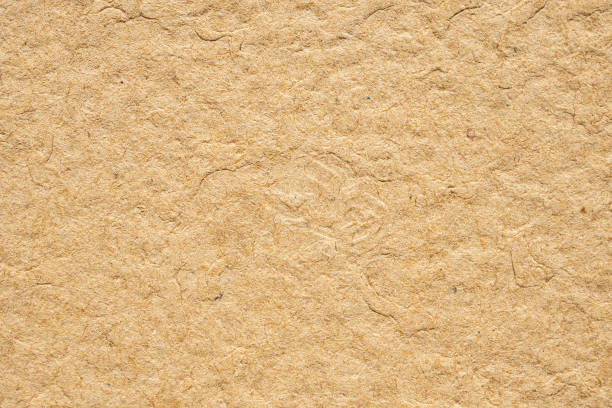 istock Brown eco recycled kraft paper texture cardboard background 1177130833
