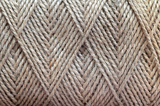 Top view of natural jute twine skein background