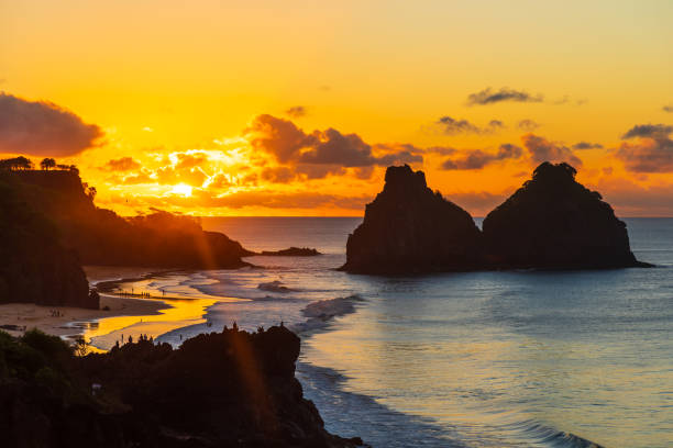 Amazing sunset in Fernando de Noronha, Brazil Fernando de Noronha is a paradisiac tropical island off the coast of Brazil two brothers mountain stock pictures, royalty-free photos & images