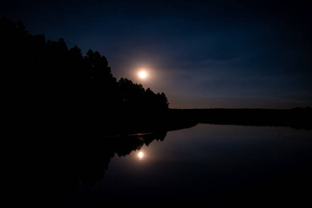 istock Moon rise at the lake 1177139645