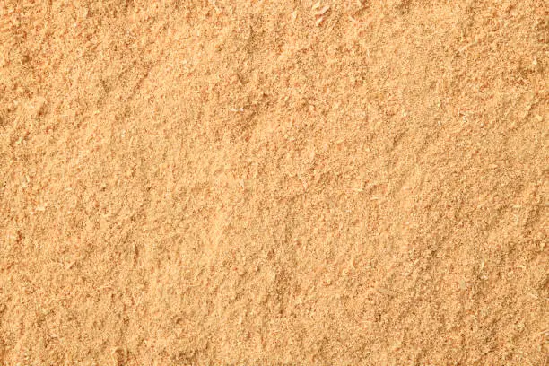 Photo of Natural sawdust textured background