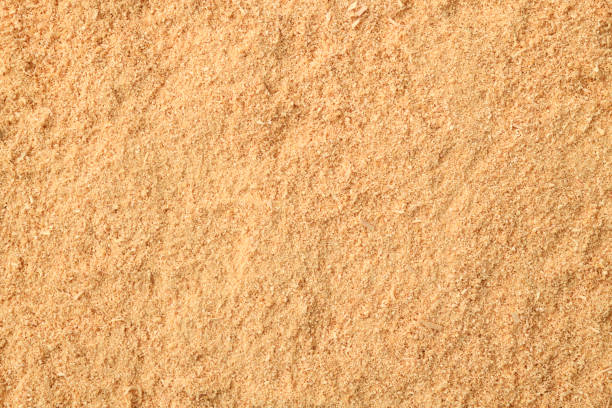 natural sawdust textured background - sawdust imagens e fotografias de stock