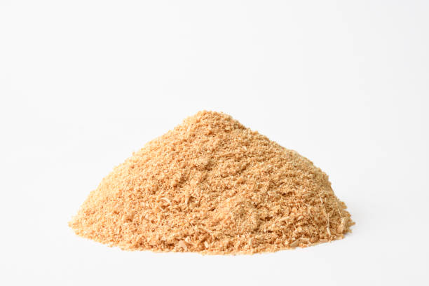 istock Pile of sawdust on white background 1177143069
