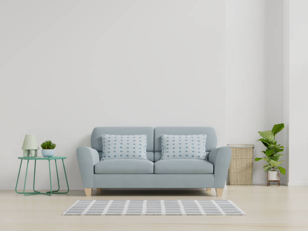 istock Modern living room interior with sofa and green plants,lamp,table on white wall background. 1177145191