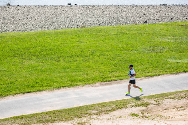 Japanese Senior man enjoying jogging