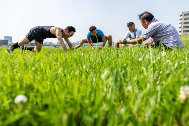 istock Four senior men stretching on the lawn 1177146044