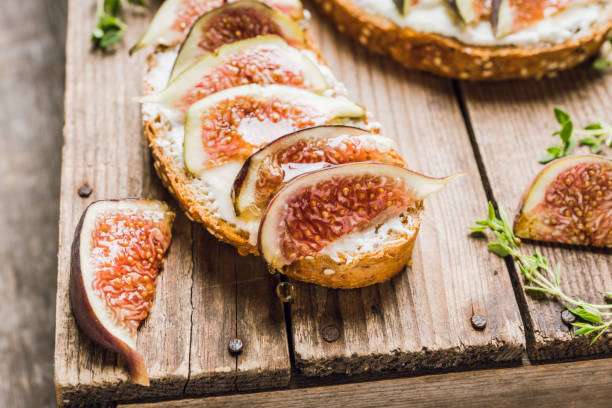 istock Sandwich with figs, cheese, honey and thyme 1177151221