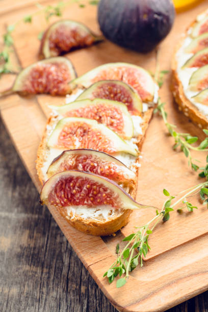 istock Sandwich with figs, cheese, honey and thyme 1177151233