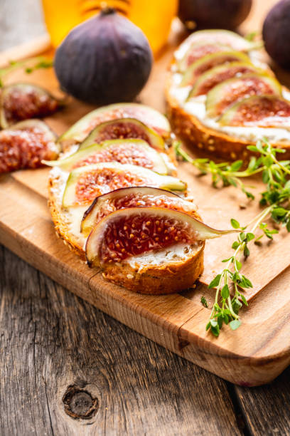 istock Sandwich with figs, cheese, honey and thyme 1177151241
