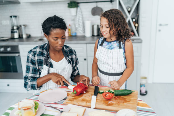 istock Mother and daughter in the kitchen 1177154677