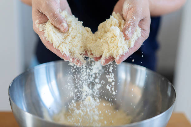 istock homemade bakery: mixing butter and flour 1177155810