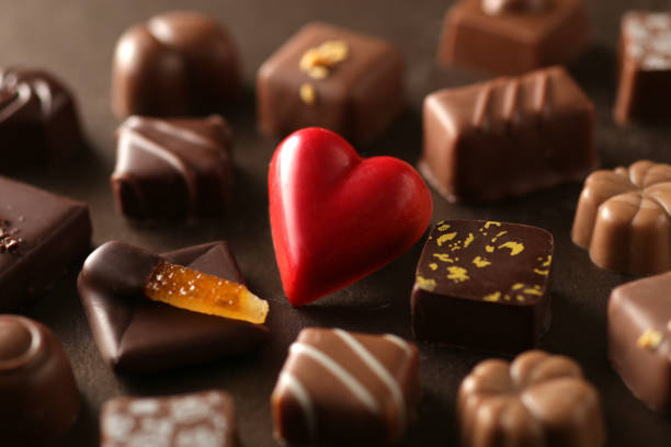 A collection of Valentine chocolates with heart-shaped chocolate stock photo