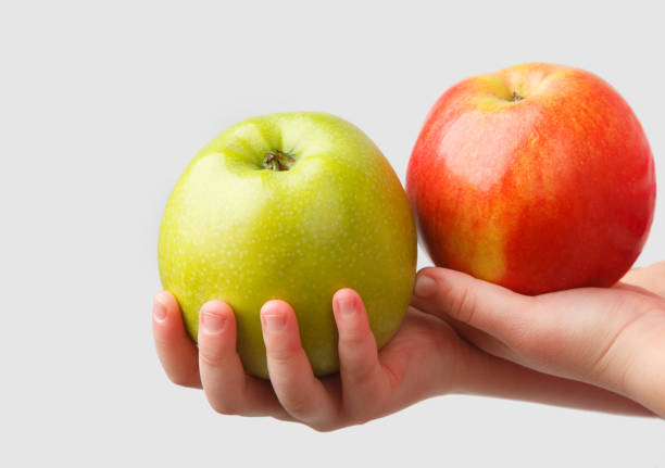 istock The apples in the hands of a child 1177158111