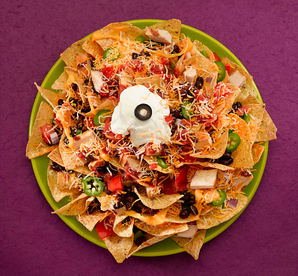 Nachos  nacho chip stock pictures, royalty-free photos & images