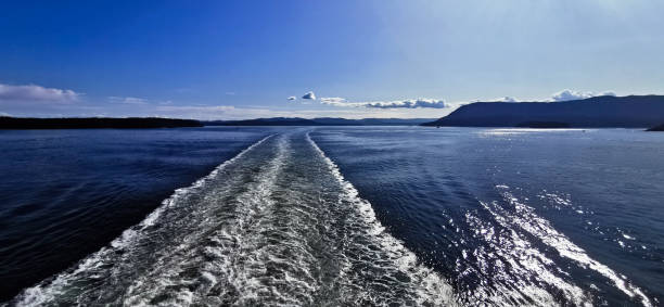 istock Wake Behind a Ferry Ship Boat on the Ocean Wide Angle 1177163995