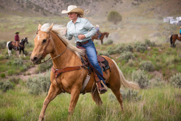 istock Cowgirl Horseback Riding 1177165074