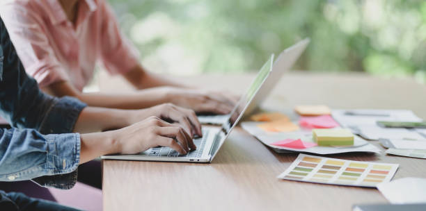 istock Successful UI web designer team working on their upcoming smartphone templates 1177165144