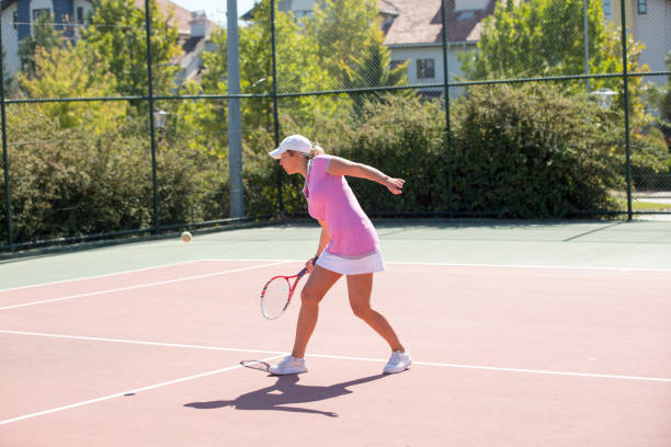 istock Young female tennis player playing tennis 1177165192