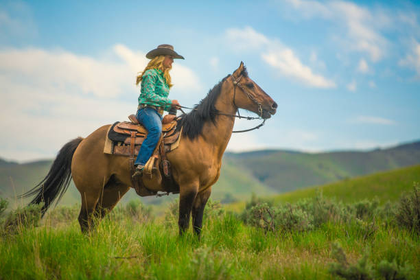 istock Cowgirl Horseback Riding 1177166474