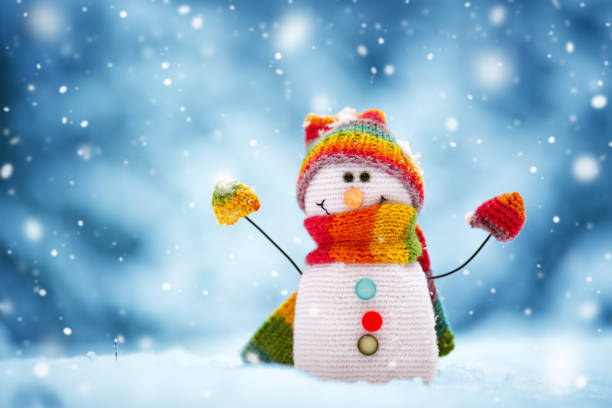 istock little snowman on soft snow on blue background 1177167435