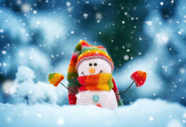 istock little snowman on soft snow on blue background 1177167651