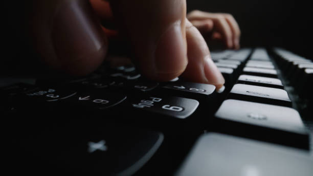 istock Close-up soft-focus finger typing on keyboard. 1177168782