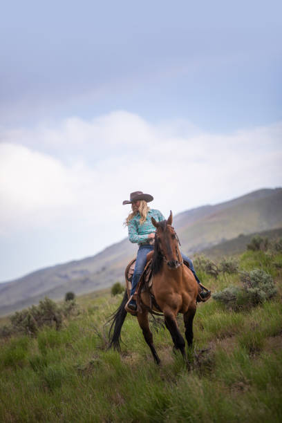 istock Cowgirl Horseback Riding 1177168926
