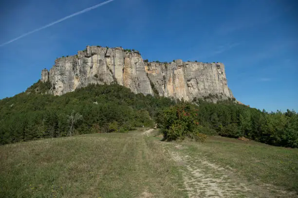 Photo of The stone of Bismantova, an isolated impressive spur in the italian appenines region.