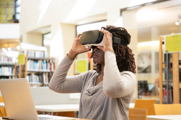 istock African American female student adjusting VR headset 1177170022
